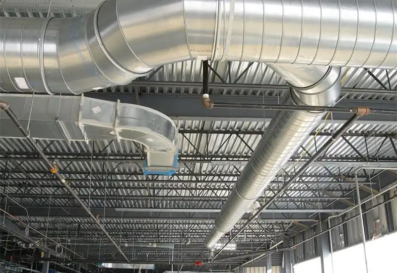 HVAC system with pocket air filters on the ceiling of a commercial space.